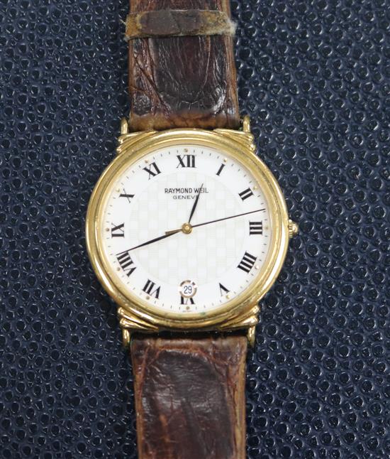 A gentlemans Raymond Weil gold plated and steel quartz wrist watch.
